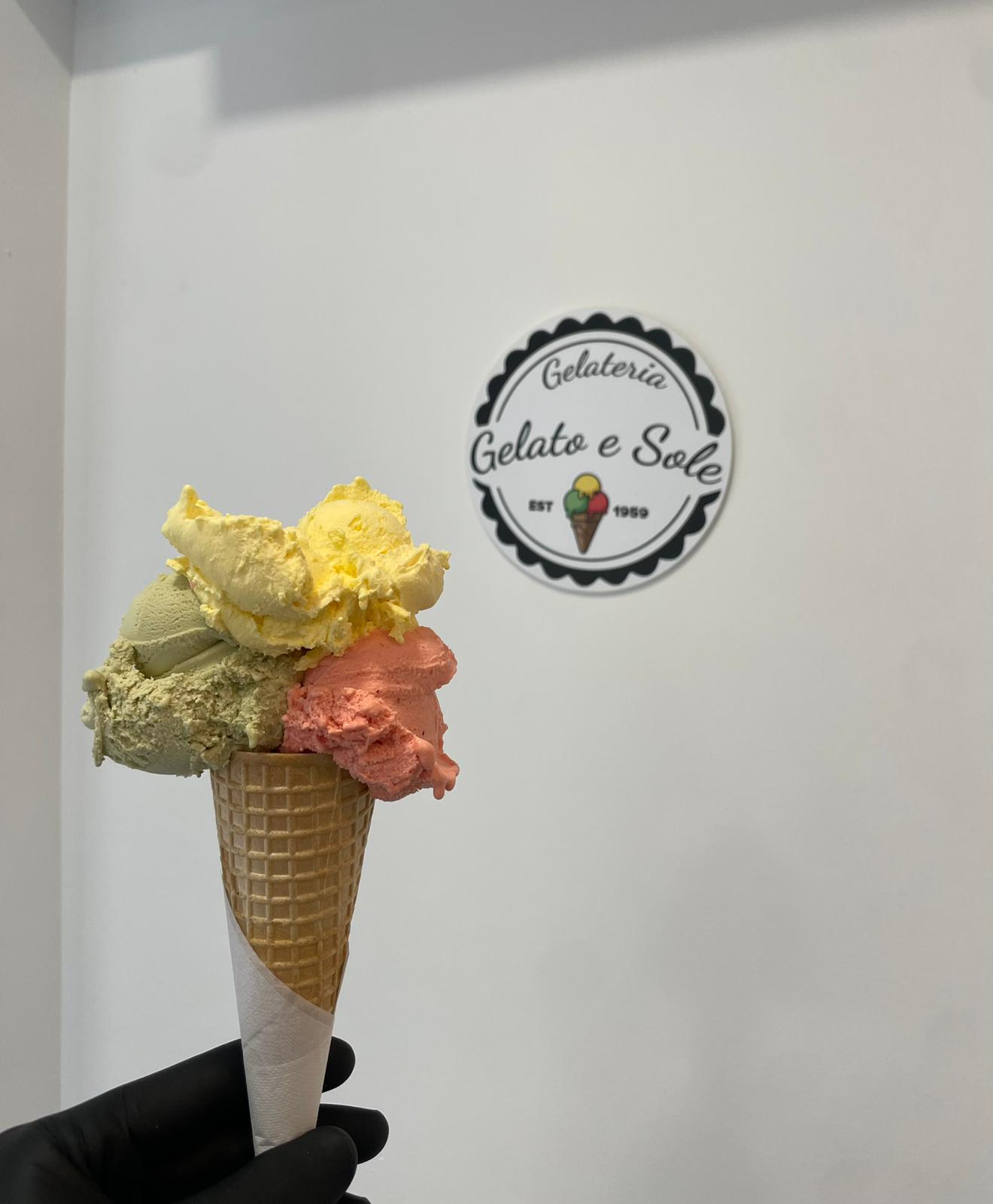 Delicious artisan ice cream cone in warm sunlight